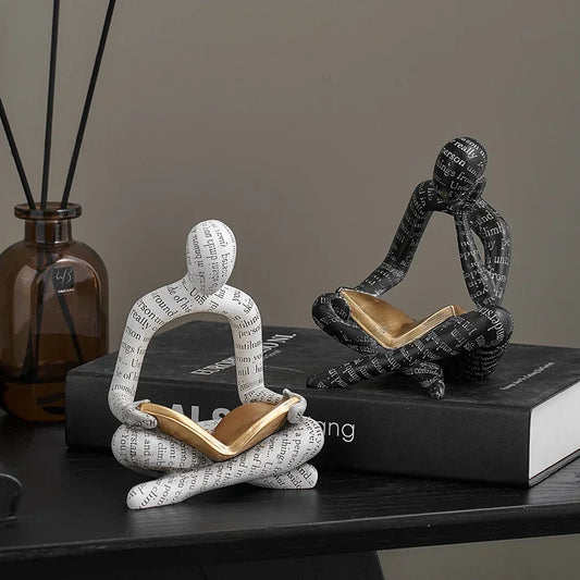 Amused Nordic Reading Sculpture